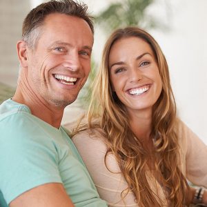 Today's Dentistry - Man and woman with great smiles